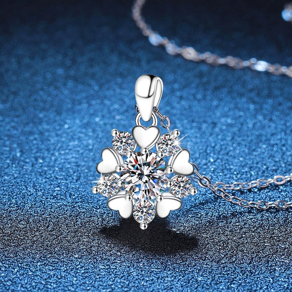Floral Starburst Moissanite Pendant Necklace in Platinum-Plated S925 Sterling Silver blue background close-up view