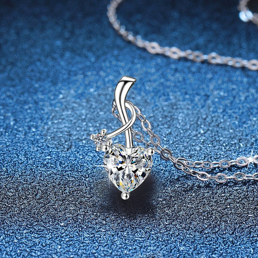 Heart Twist Moissanite Pendant Necklace in Platinum-Plated S925 Sterling Silver blue background angled view