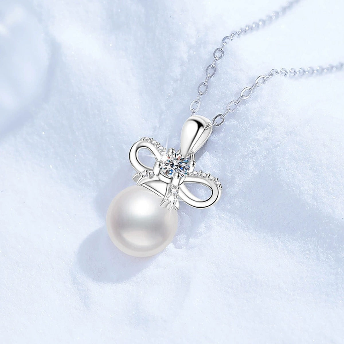 Bow Moissanite Freshwater Pearl Pendant Necklace with Cubic Zirconia in White Gold-Plated S925 Sterling Silver close-up product detail view