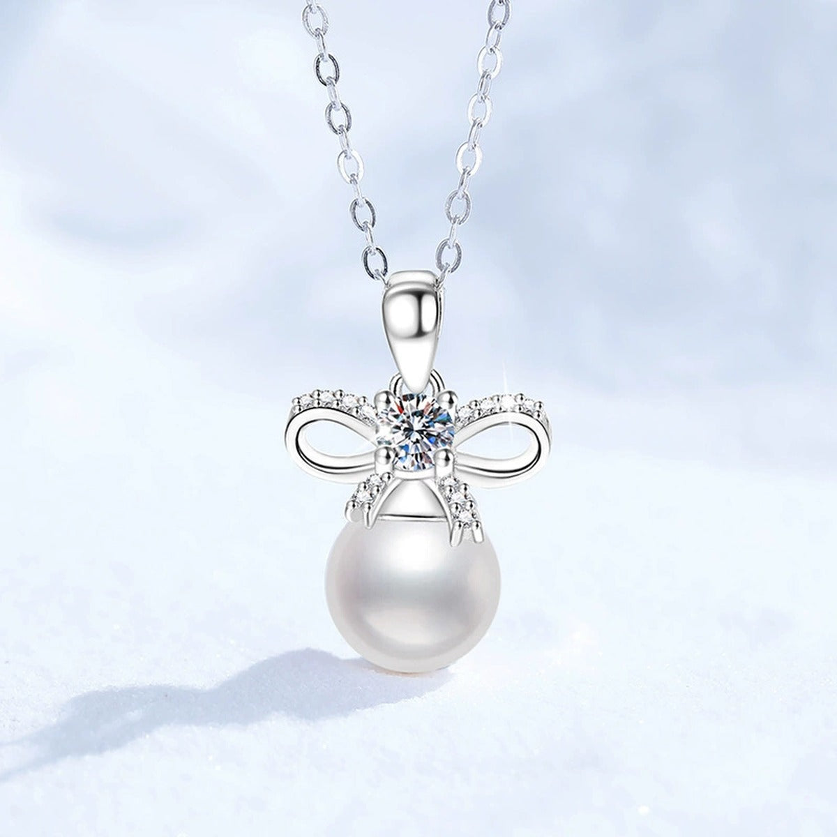 Bow Moissanite Freshwater Pearl Pendant Necklace with Cubic Zirconia in White Gold-Plated S925 Sterling Silver close-up product detail view
