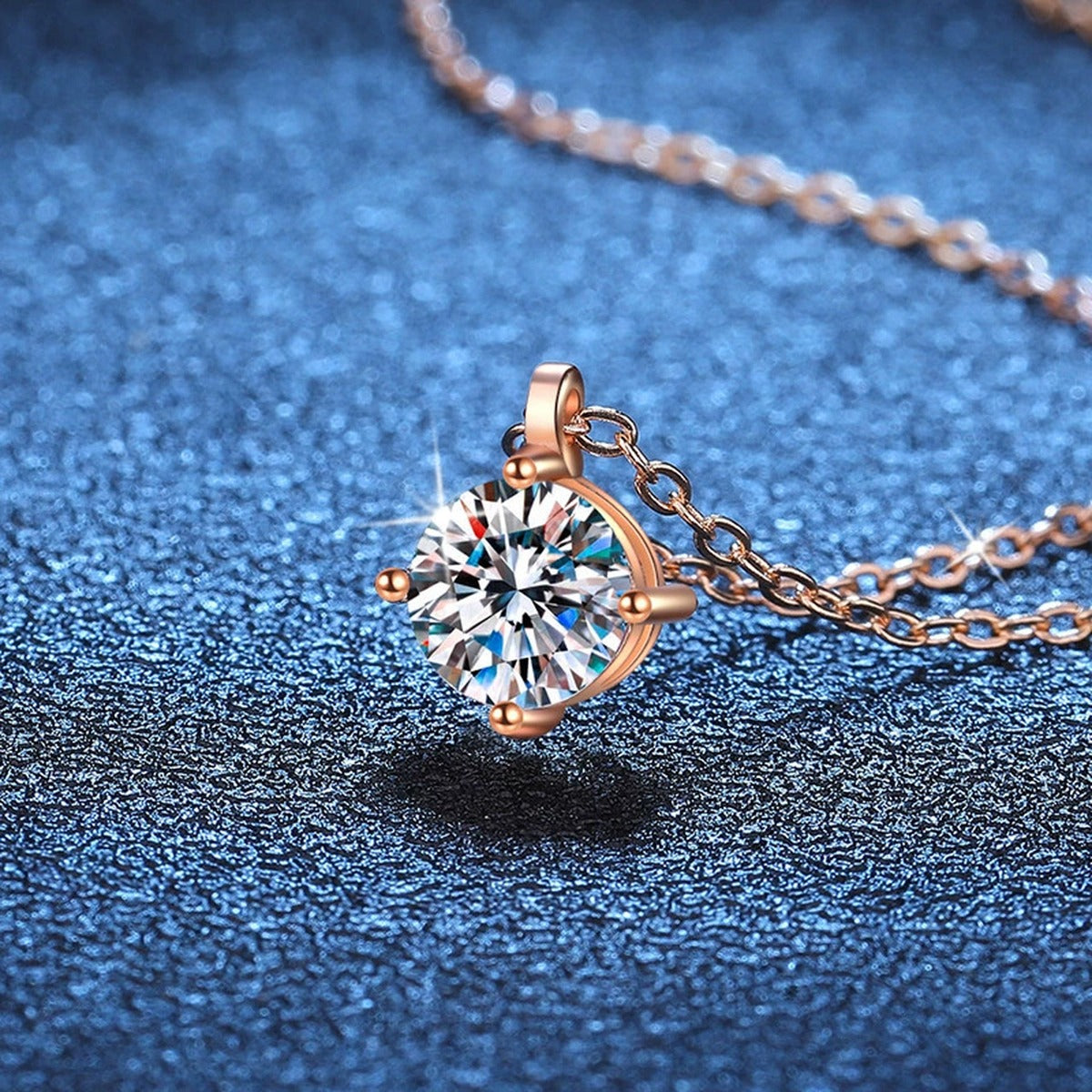 Round Solitaire Moissanite Pendant Necklace in Gold-Plated S925 Sterling Silver blue background product view
