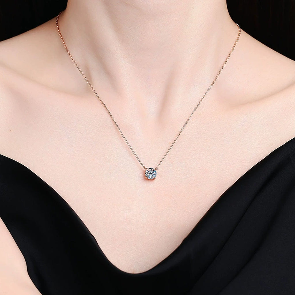 Round Solitaire Moissanite Pendant Necklace in 18K Yellow Gold-Plated S925 Sterling Silver worn on neckline by model