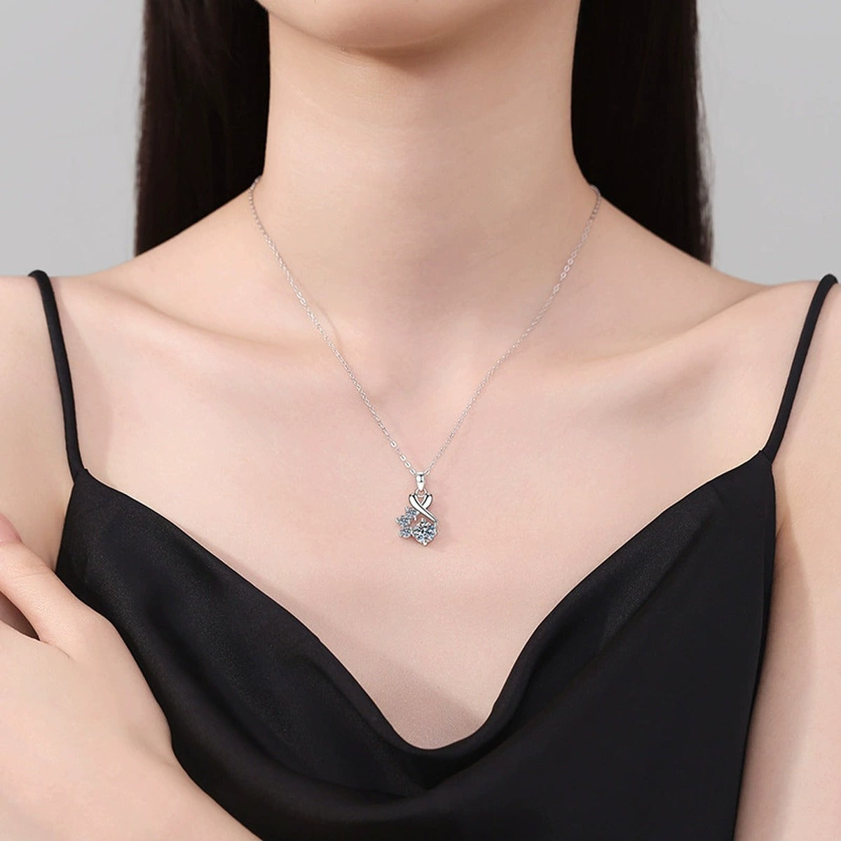 Twist Cluster Moissanite Pendant Necklace in Platinum-Plated S925 Sterling Silver worn on neckline by model