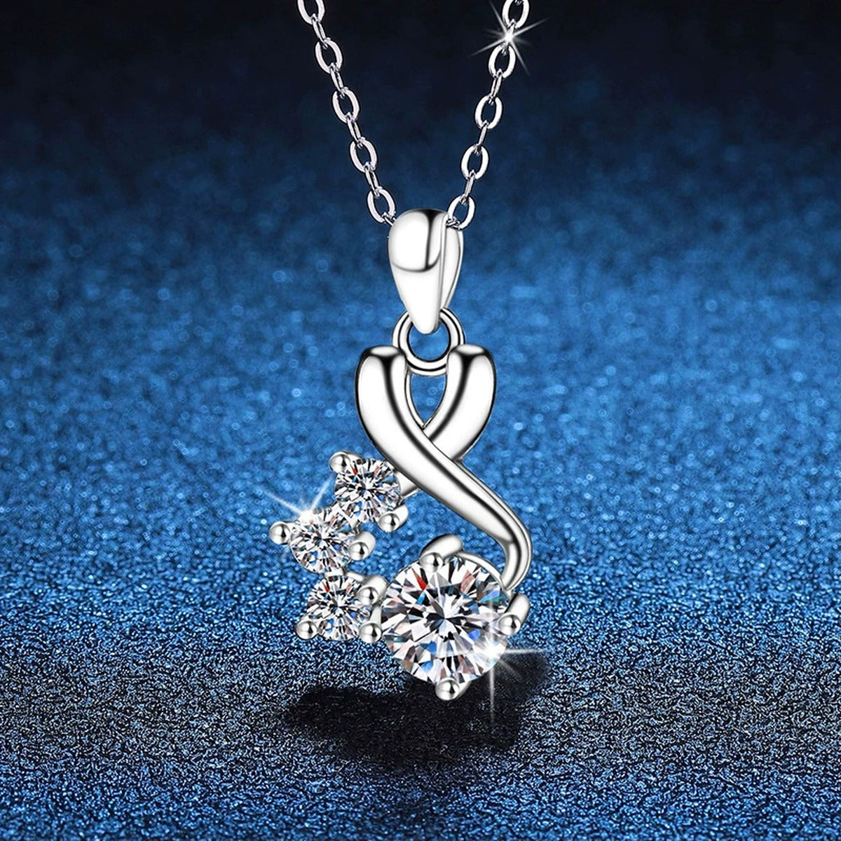 Twist Cluster Moissanite Pendant Necklace in Platinum-Plated S925 Sterling Silver blue background close-up view