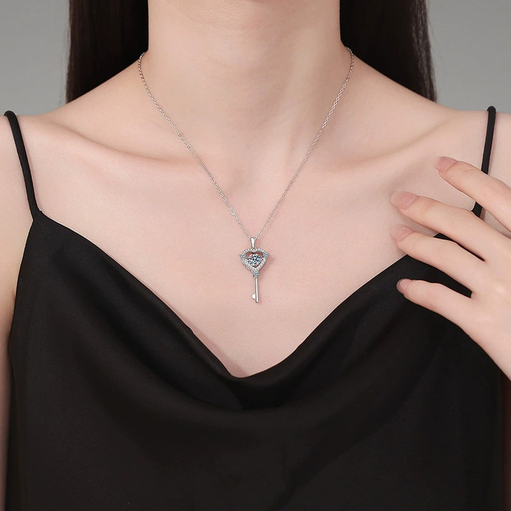 Heart Key Moissanite Pendant Necklace in Platinum-Plated S925 Sterling Silver worn on neckline by model