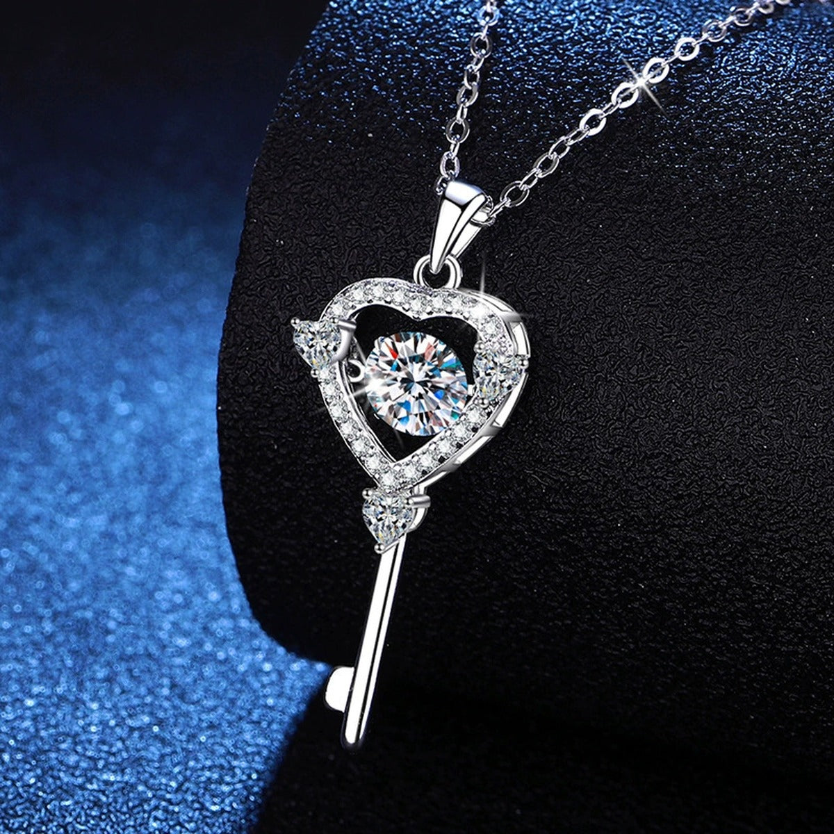 Heart Key Moissanite Pendant Necklace in Platinum-Plated S925 Sterling Silver blue background close-up view