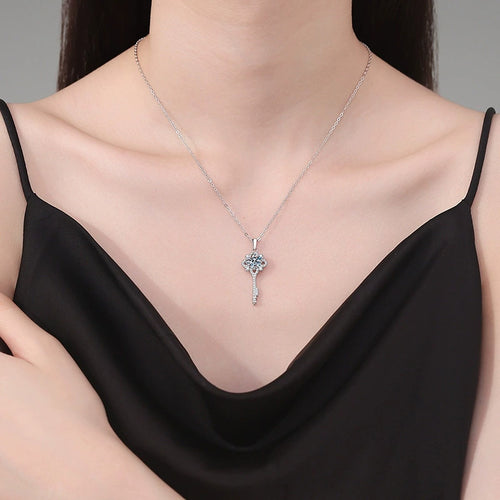 Cross Key Moissanite Pendant Necklace in Platinum-Plated S925 Sterling Silver worn on neckline by model