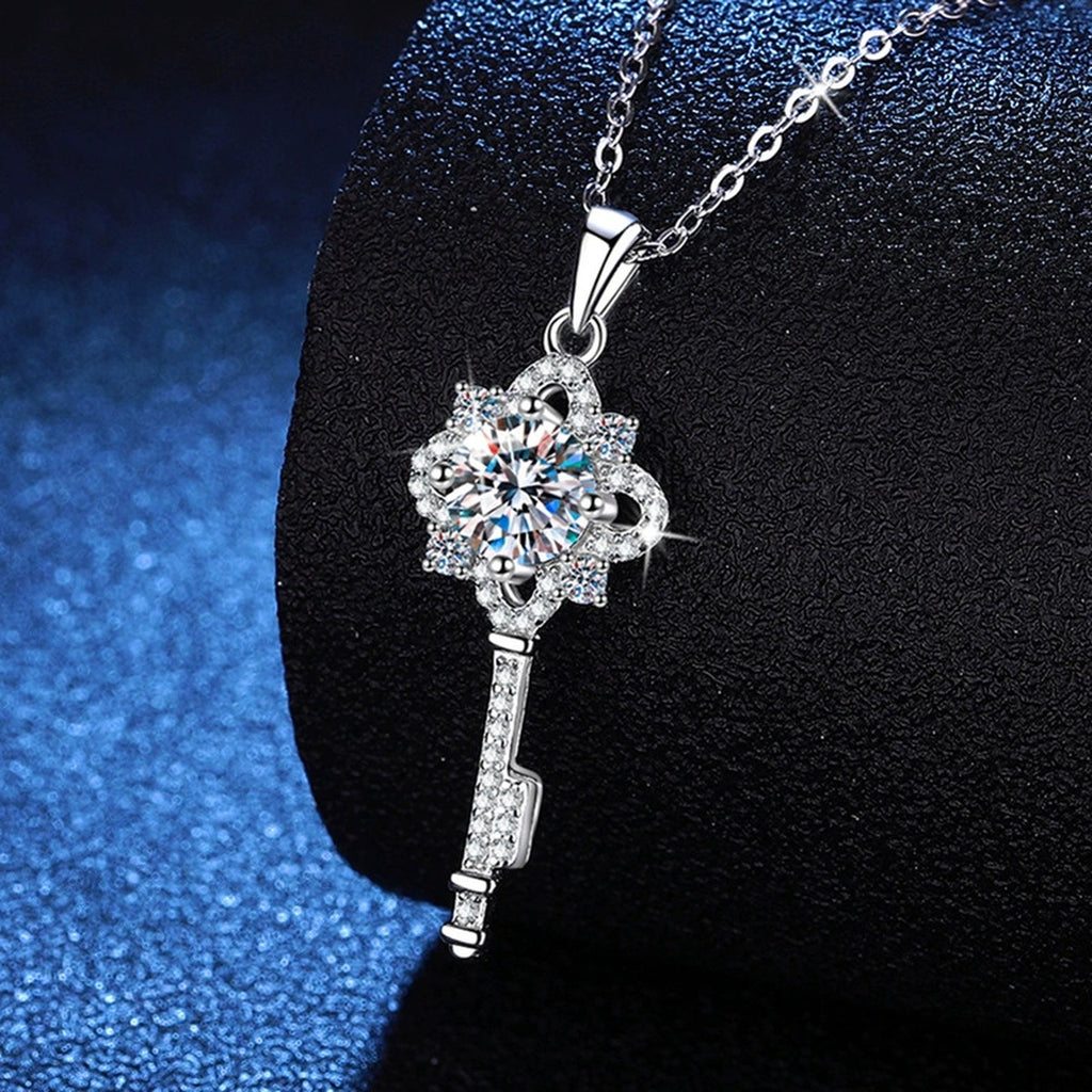 Cross Key Moissanite Pendant Necklace in Platinum-Plated S925 Sterling Silver blue background close-up view