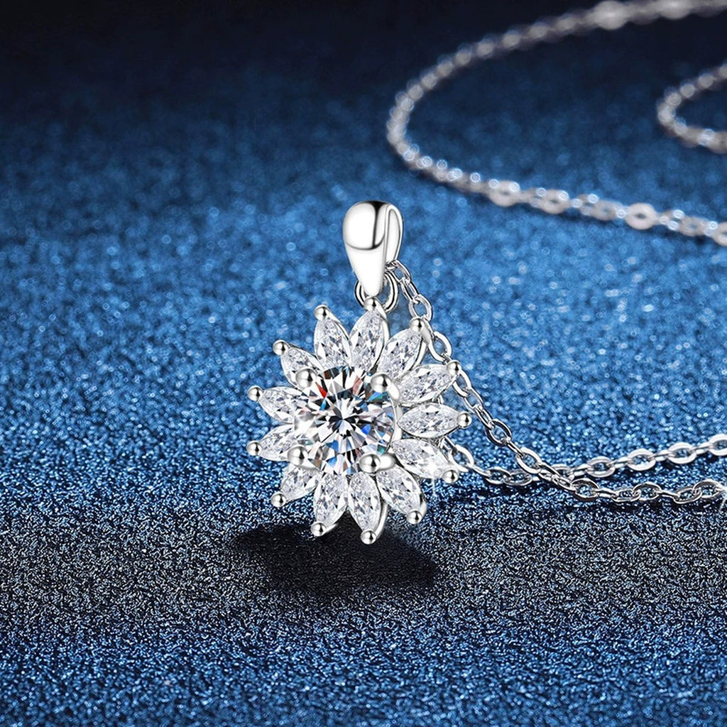 Starburst Moissanite Pendant Necklace in Platinum-Plated S925 Sterling Silver blue background angled view