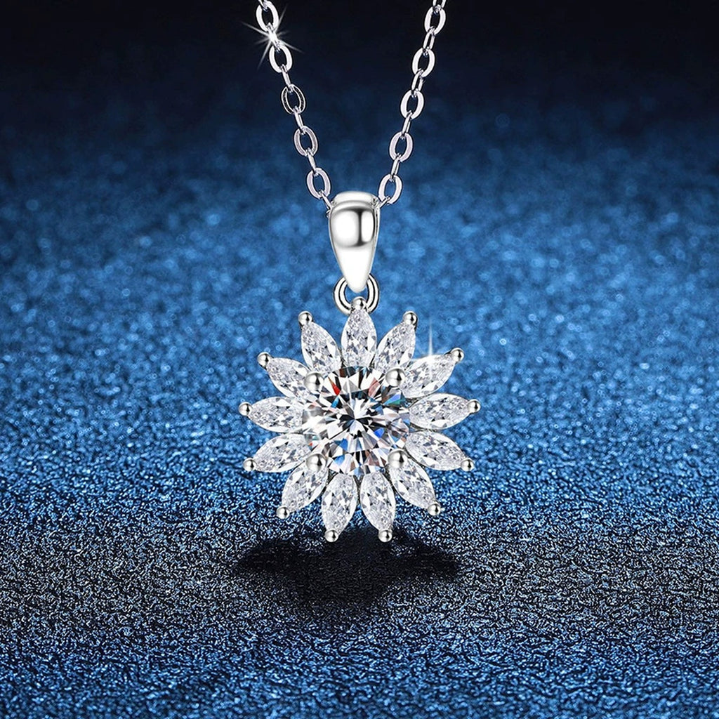 Starburst Moissanite Pendant Necklace in Platinum-Plated S925 Sterling Silver blue background close-up view