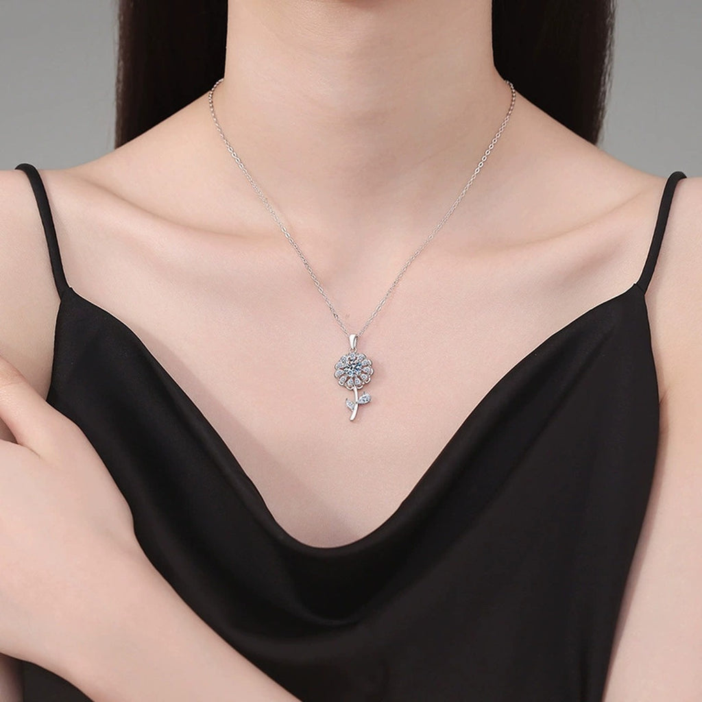 Floral Stem Moissanite Pendant Necklace in Platinum-Plated S925 Sterling Silver worn on neckline by model