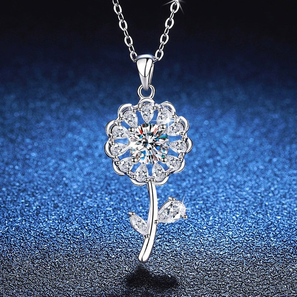 Floral Stem Moissanite Pendant Necklace in Platinum-Plated S925 Sterling Silver blue background angled view