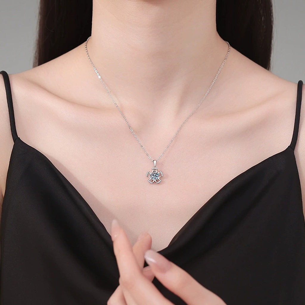 Bow Flower Moissanite Pendant Necklace in Platinum-Plated S925 Sterling Silver worn on neckline by model