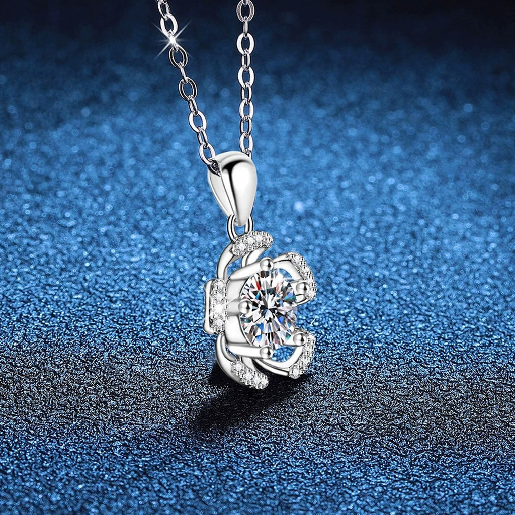 Bow Flower Moissanite Pendant Necklace in Platinum-Plated S925 Sterling Silver blue background product view