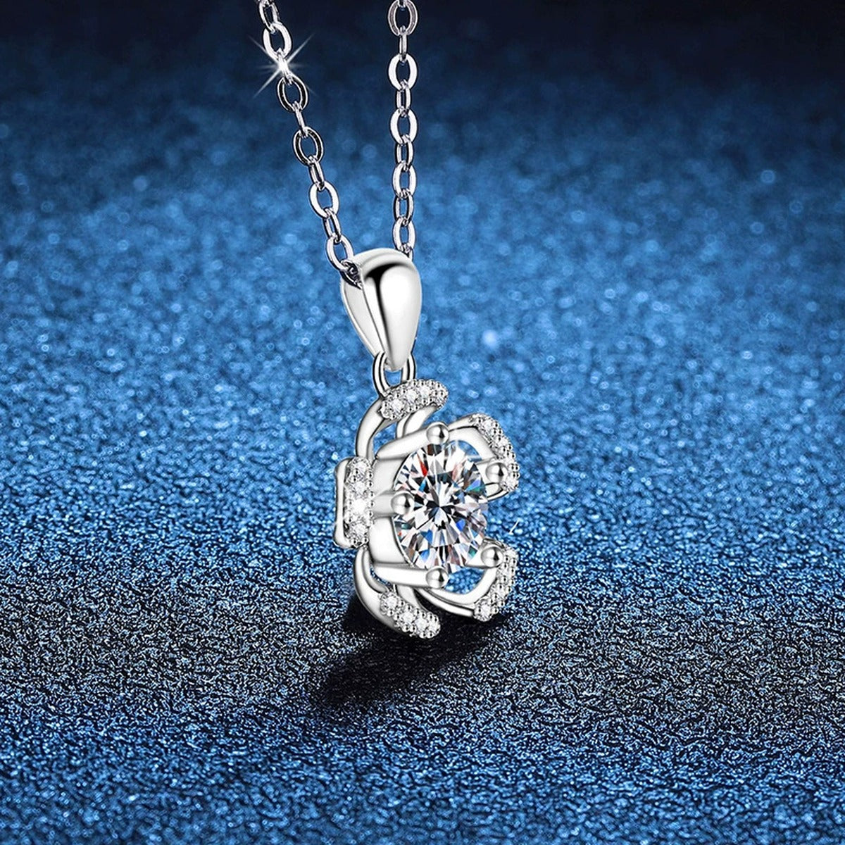 Bow Flower Moissanite Pendant Necklace in Platinum-Plated S925 Sterling Silver blue background product view
