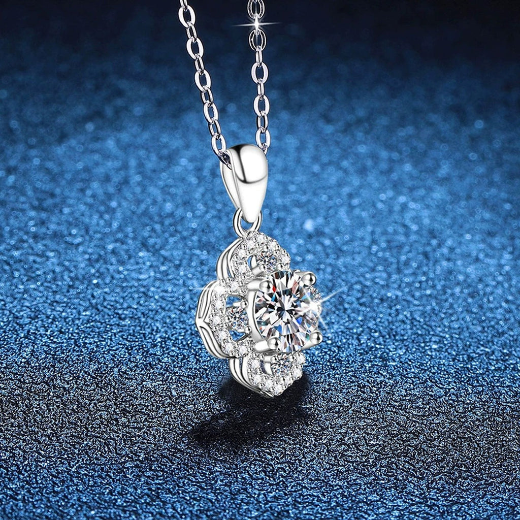 Clover Halo Moissanite Pendant Necklace in Platinum-Plated S925 Sterling Silver blue background angled view