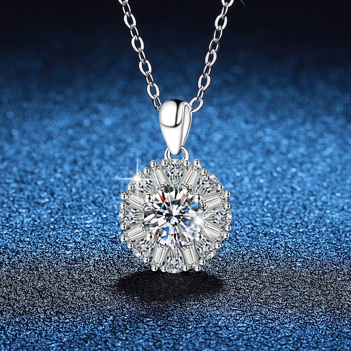Sunburst Halo Moissanite Pendant Necklace in Platinum-Plated S925 Sterling Silver blue background close-up view