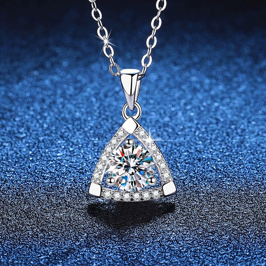 Trillion Halo Moissanite Pendant Necklace in Platinum-Plated S925 Sterling Silver blue background angled view