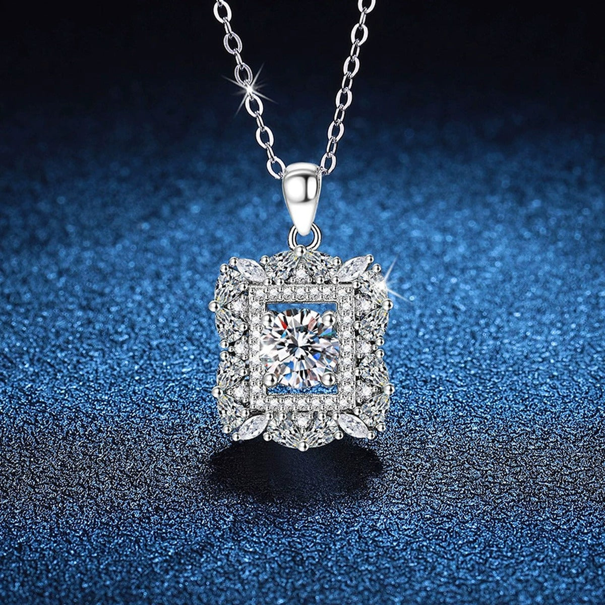 Square Halo Moissanite Pendant Necklace in Platinum-Plated S925 Sterling Silver blue background close-up view