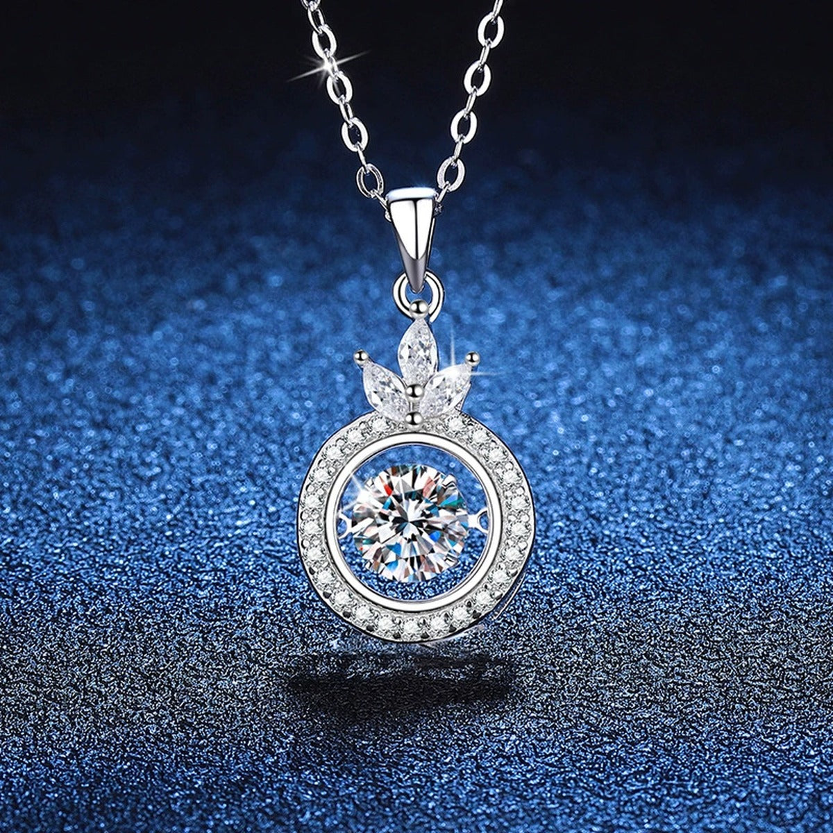 Crown Round Halo Moissanite Pendant Necklace in Platinum-Plated S925 Sterling Silver blue background angled view