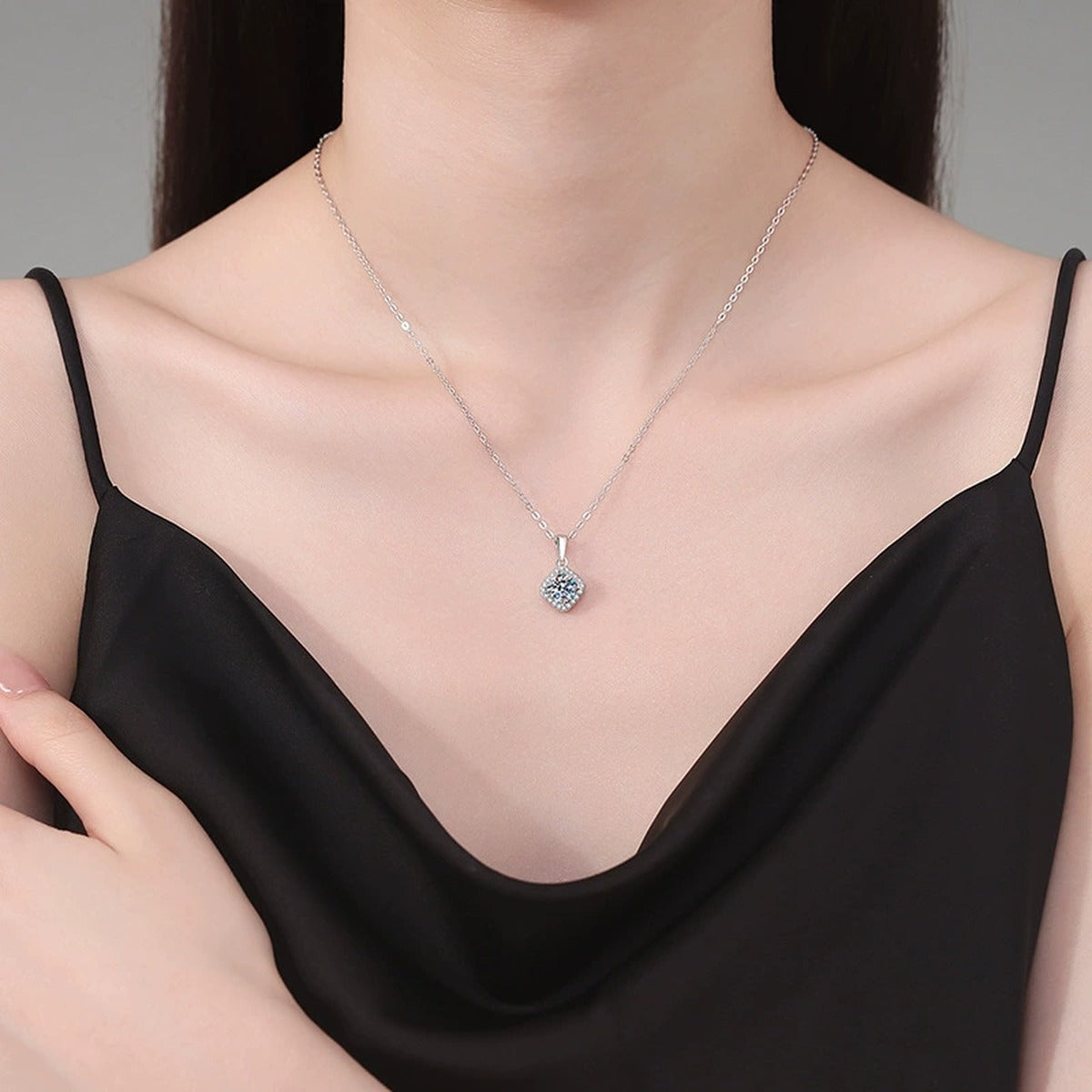 Kite Halo Moissanite Pendant Necklace in Platinum-Plated S925 Sterling Silver worn on neckline by model