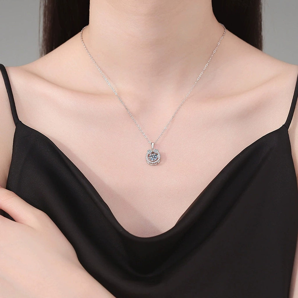 Oval Halo Moissanite Pendant Necklace in Platinum-Plated S925 Sterling Silver worn on neckline by model