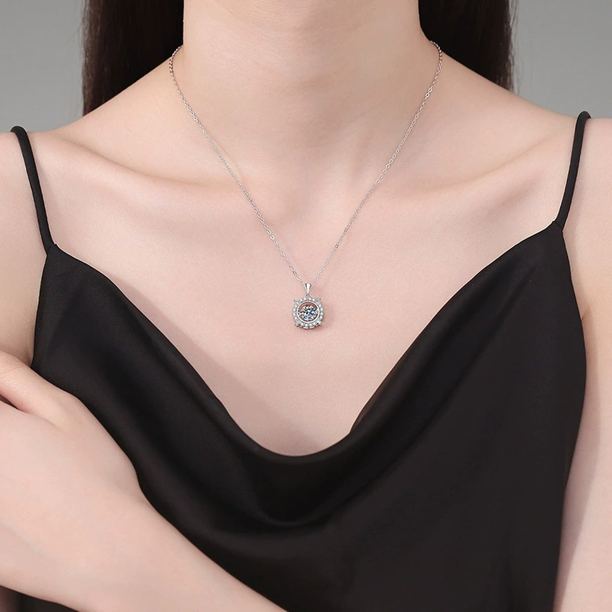 Starburst Frame Halo Moissanite Pendant Necklace in Platinum-Plated S925 Sterling Silver worn on neckline by model