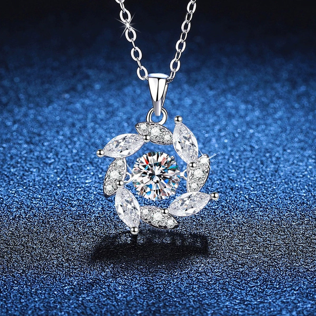 Swirl Marquise Halo Moissanite Pendant Necklace in Platinum-Plated S925 Sterling Silver blue background angled view