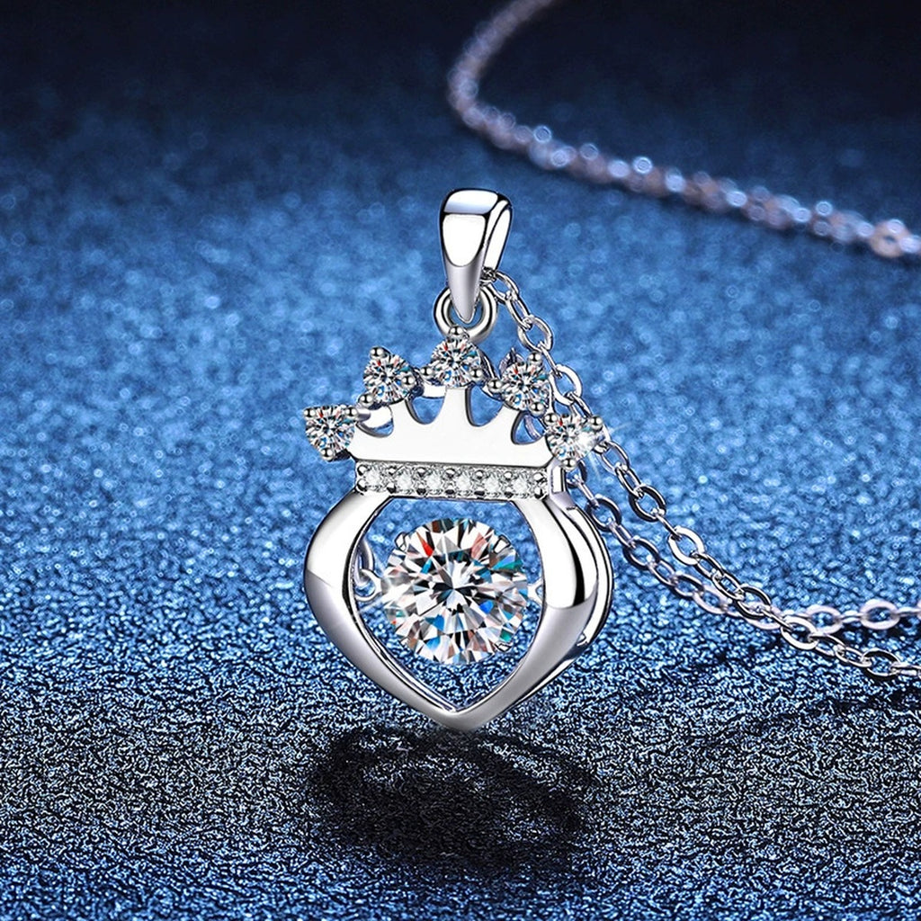 Crown Heart Moissanite Pendant Necklace in Platinum-Plated S925 Sterling Silver blue background angled view