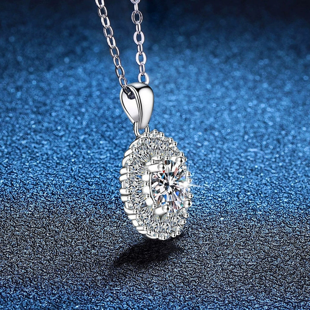 Sunburst Halo Moissanite Pendant Necklace in Platinum-Plated S925 Sterling Silver blue background product view