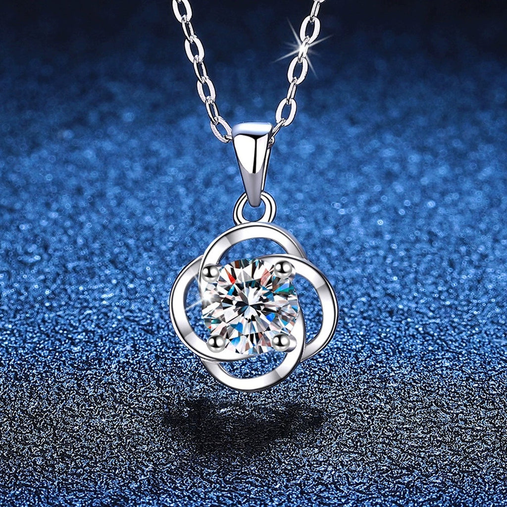 Round Loop Moissanite Pendant Necklace in Platinum-Plated S925 Sterling Silver blue background angled view