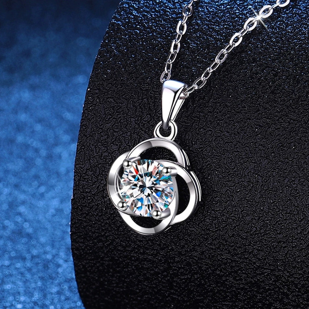 Round Loop Moissanite Pendant Necklace in Platinum-Plated S925 Sterling Silver blue background close-up view