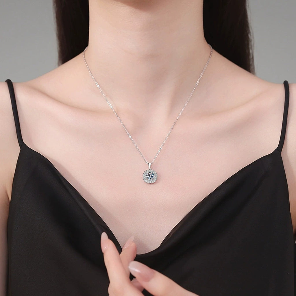 Baguette Halo Moissanite Pendant Necklace in Platinum-Plated S925 Sterling Silver worn on neckline by model