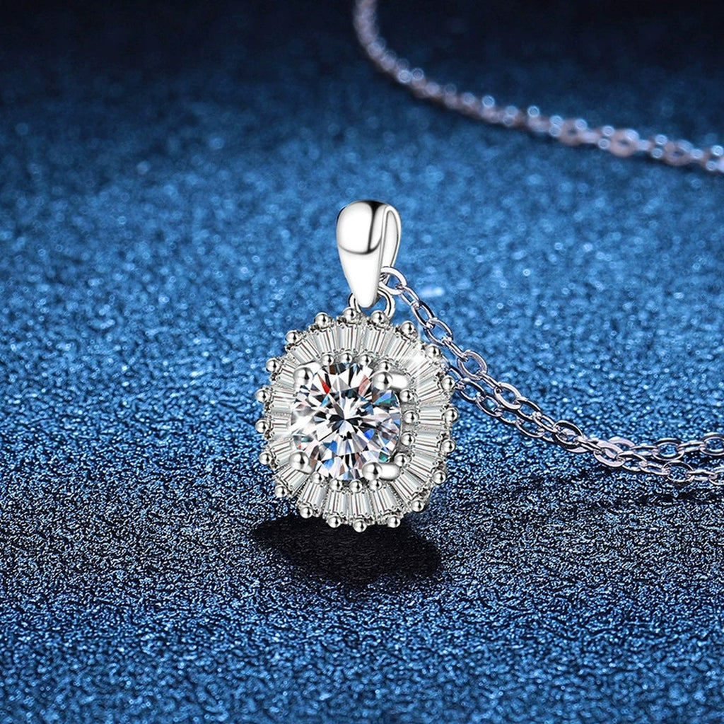 Baguette Halo Moissanite Pendant Necklace in Platinum-Plated S925 Sterling Silver blue background angled view