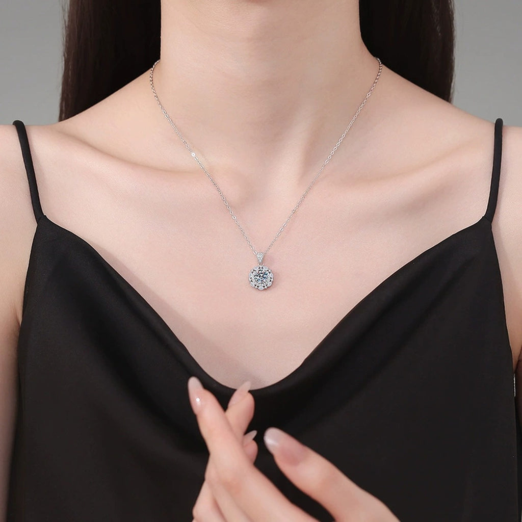 Round Halo Moissanite Pendant Necklace in Platinum-Plated S925 Sterling Silver worn on neckline by model