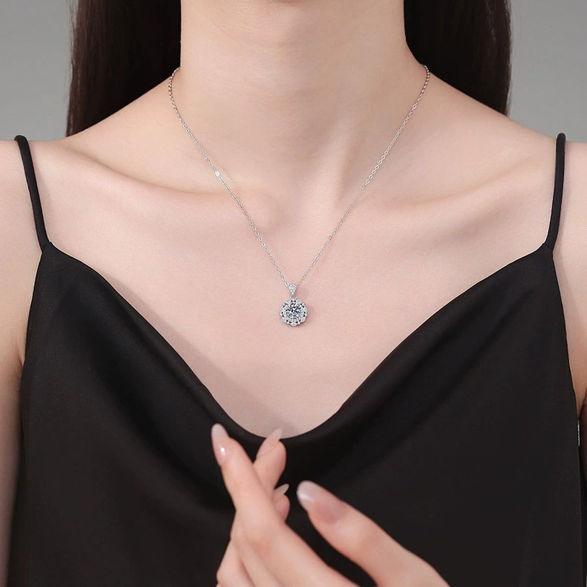 Round Halo Moissanite Pendant Necklace in Platinum-Plated S925 Sterling Silver worn on neckline by model