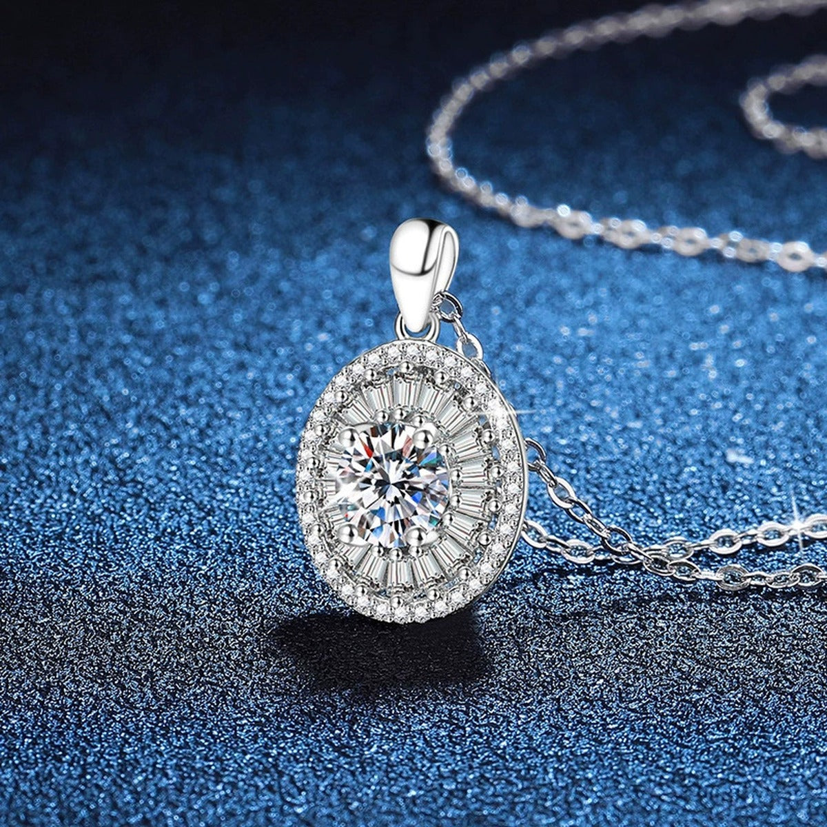 Round Baguette Halo Moissanite Pendant Necklace in Platinum-Plated S925 Sterling Silver blue background angled view