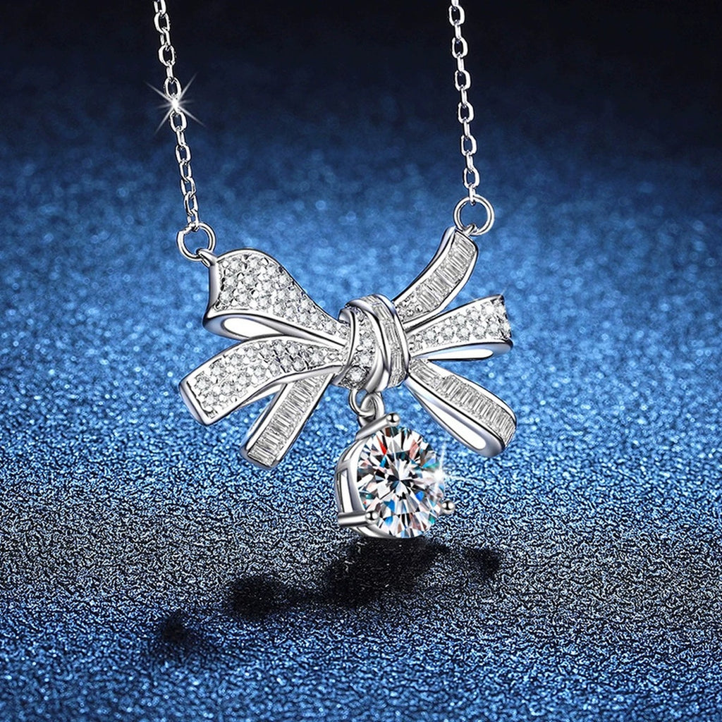 Bow Drop Moissanite Pendant Necklace in Platinum-Plated S925 Sterling Silver blue background product view
