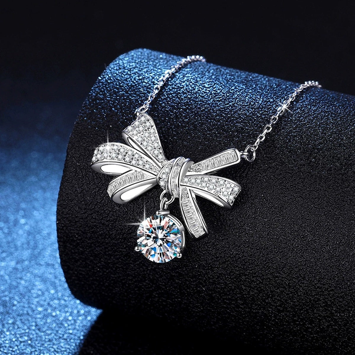 Bow Drop Moissanite Pendant Necklace in Platinum-Plated S925 Sterling Silver dark background product display view