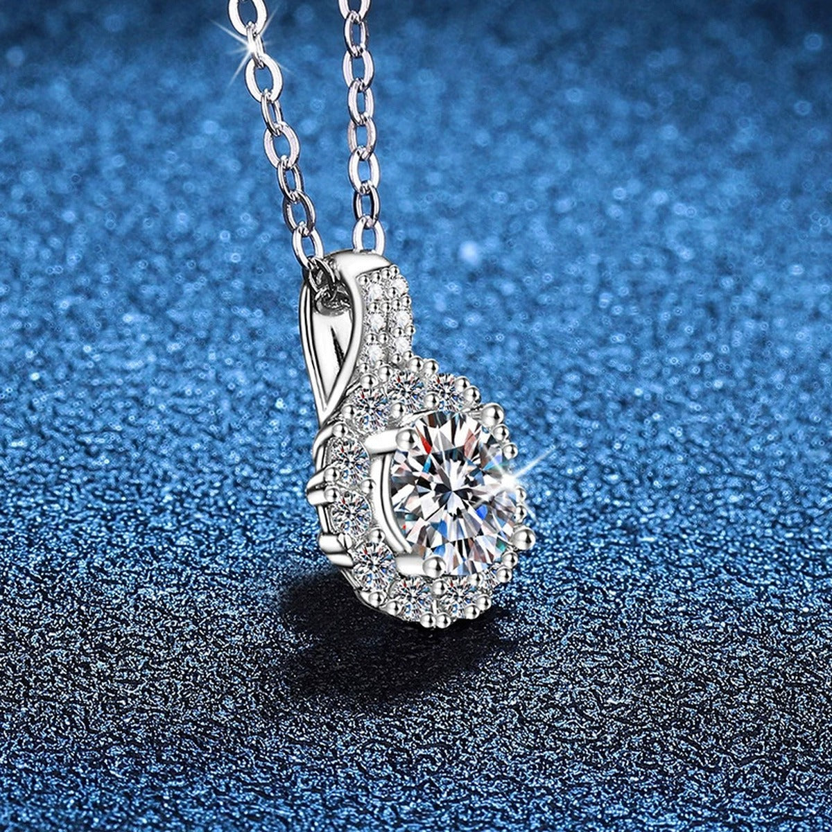 Round Halo Moissanite Pendant Necklace in Platinum-Plated S925 Sterling Silver blue background product view