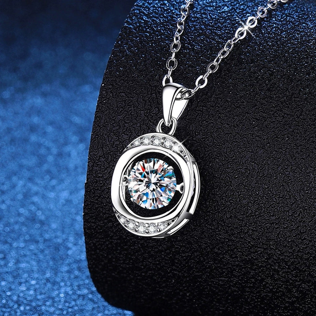 Round Orbital Halo Moissanite Pendant Necklace in Platinum-Plated S925 Sterling Silver blue background close-up view