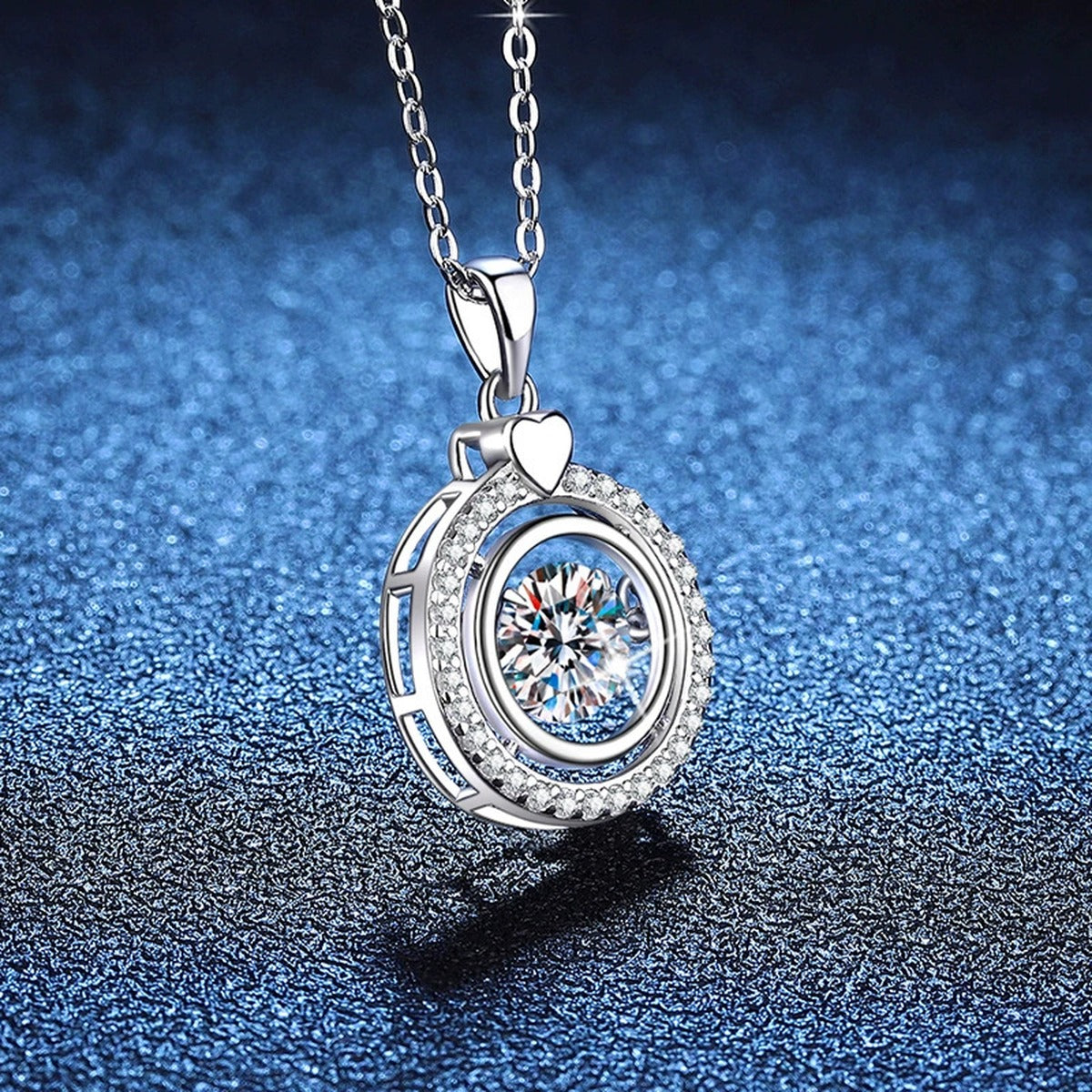 Heart Charm Round Halo Moissanite Pendant Necklace in Platinum-Plated S925 Sterling Silver blue background product view