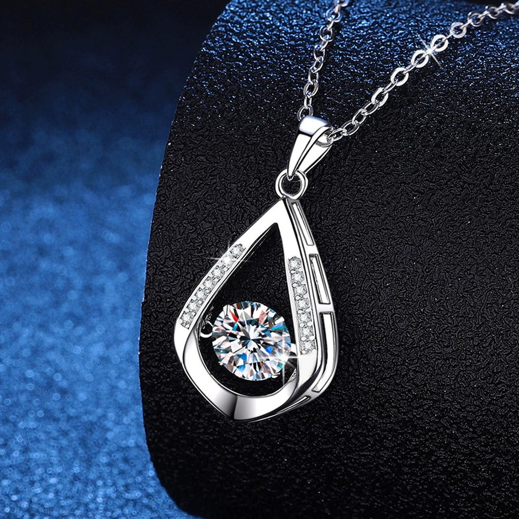 Teardrop Halo Moissanite Pendant Necklace in Platinum-Plated S925 Sterling Silver blue background close-up view