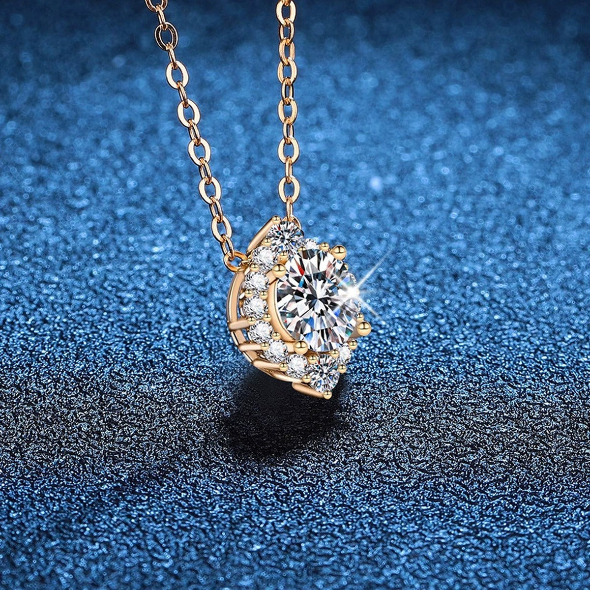 Round Halo Moissanite Pendant Necklace in Champagne Gold-Plated S925 Sterling Silver blue background angled view