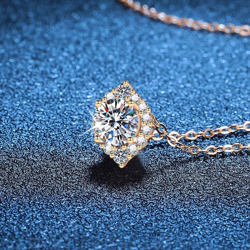 Round Halo Moissanite Pendant Necklace in Champagne Gold-Plated S925 Sterling Silver blue background close-up view