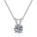 Classic Round Moissanite Solitaire Pendant Necklace in Platinum-Plated S925 Sterling Silver on clean white background showing the four-prong round solitaire pendant