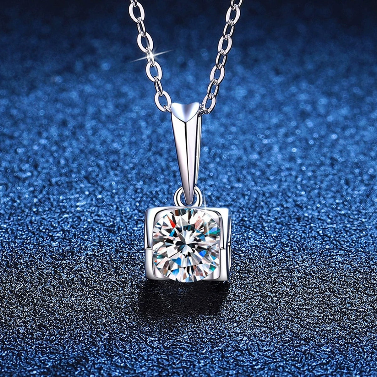 Square Frame Moissanite Pendant Necklace in Platinum-Plated S925 Sterling Silver blue background angled view