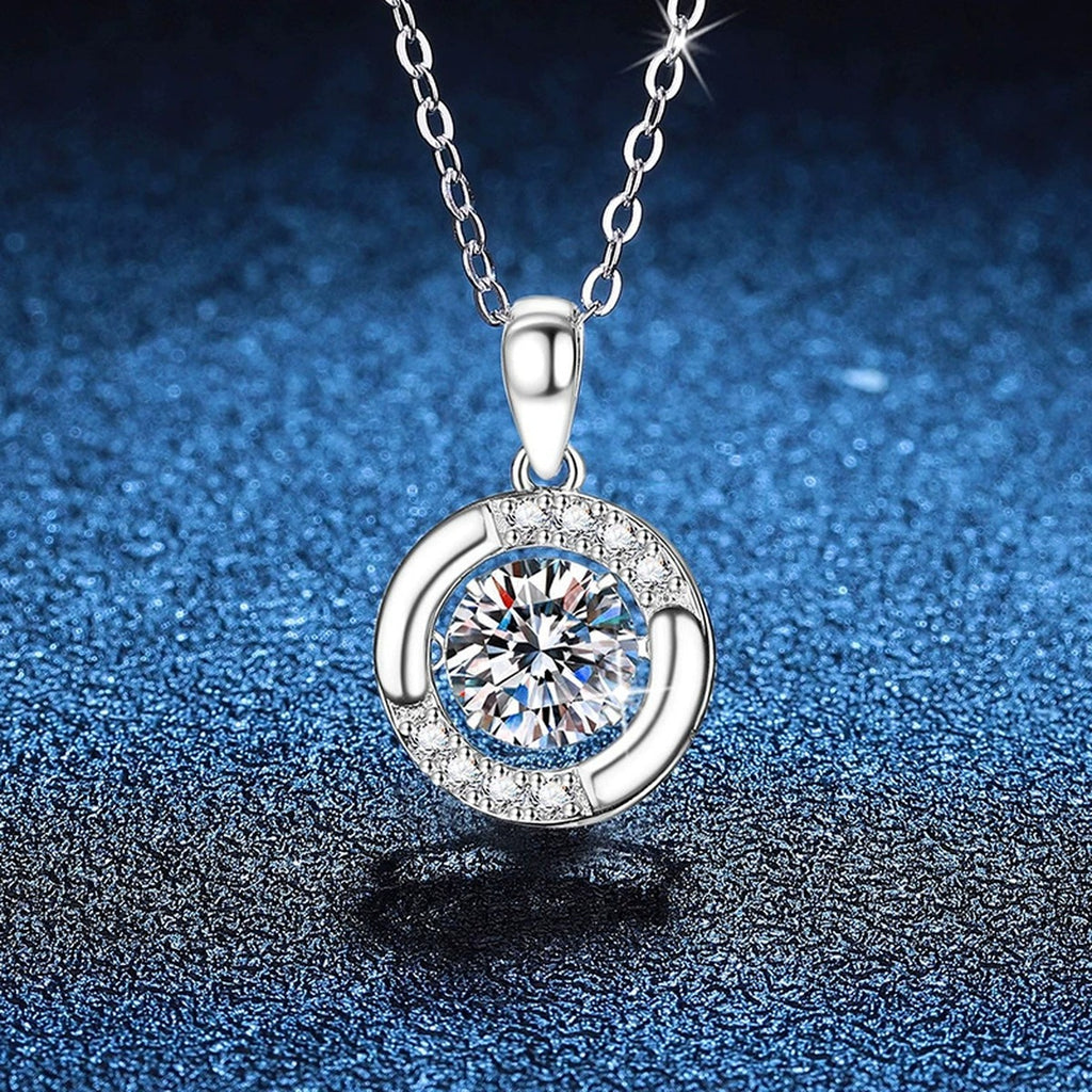 Crescent Halo Moissanite Pendant Necklace in Platinum-Plated S925 Sterling Silver blue background angled view