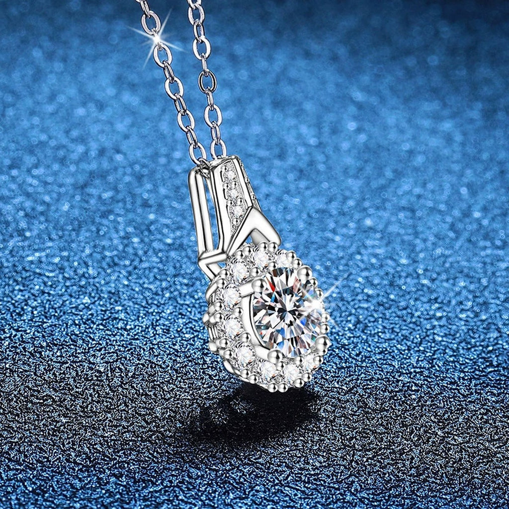 Round Halo Moissanite Pendant Necklace in Platinum-Plated S925 Sterling Silver blue background product view