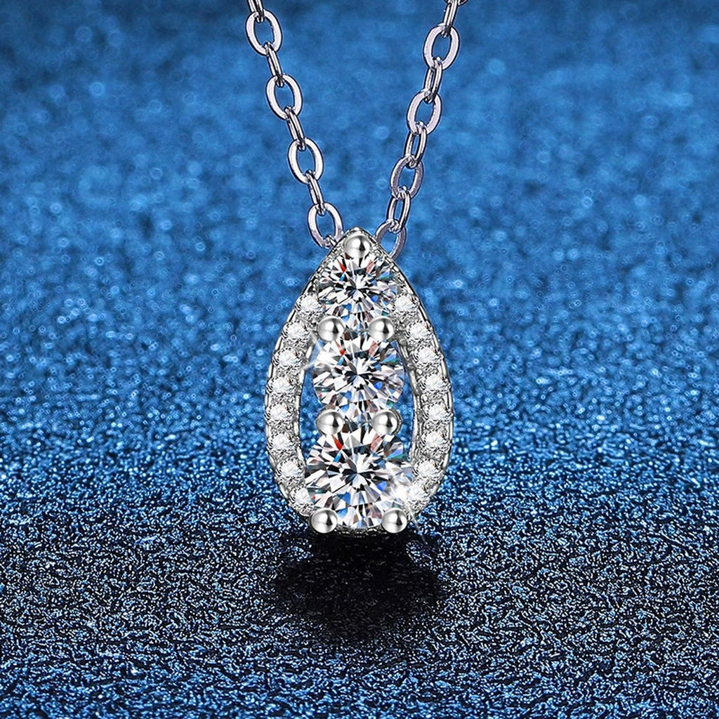 Teardrop Cluster Moissanite Pendant Necklace in Platinum-Plated S925 Sterling Silver blue background product view
